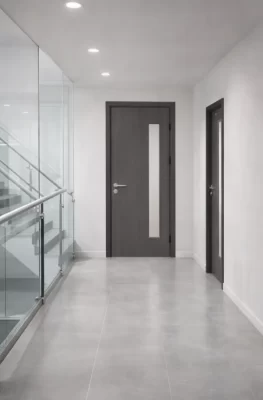 Cửa nhựa giả gỗ có ô kính lấy sáng cho hành lang chung cư hiện đại tại Nha Trang